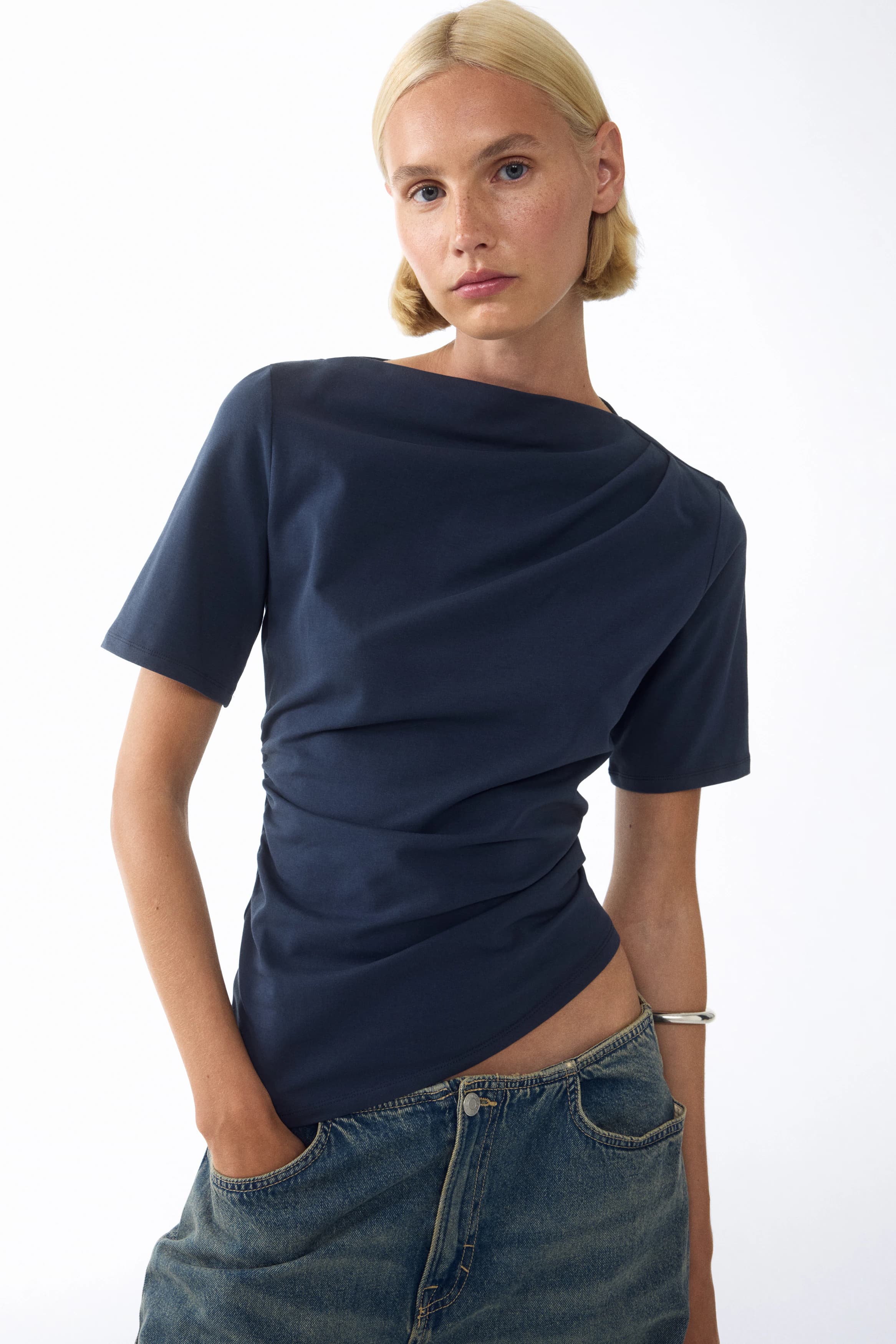 Asymmetrische top met drapering