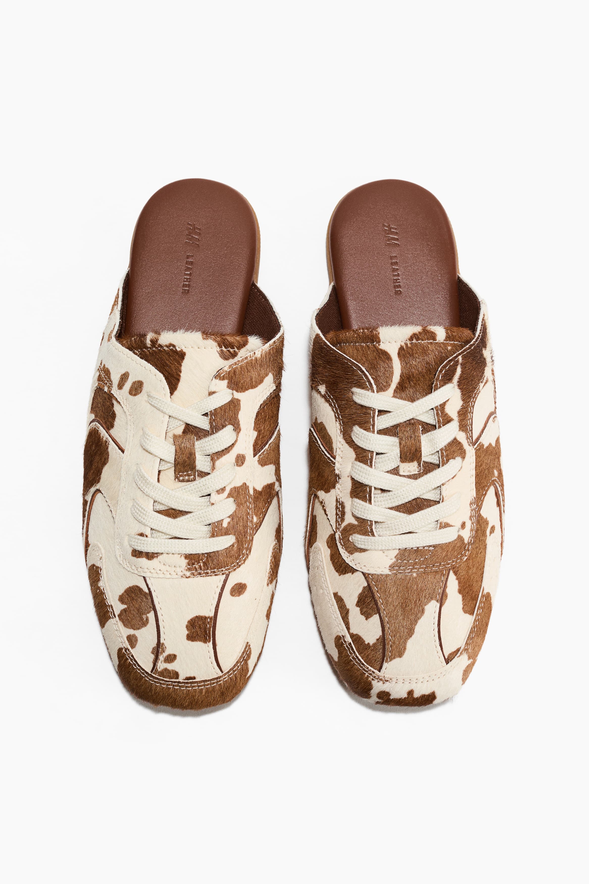 Leren slip-ins met sneakerlook