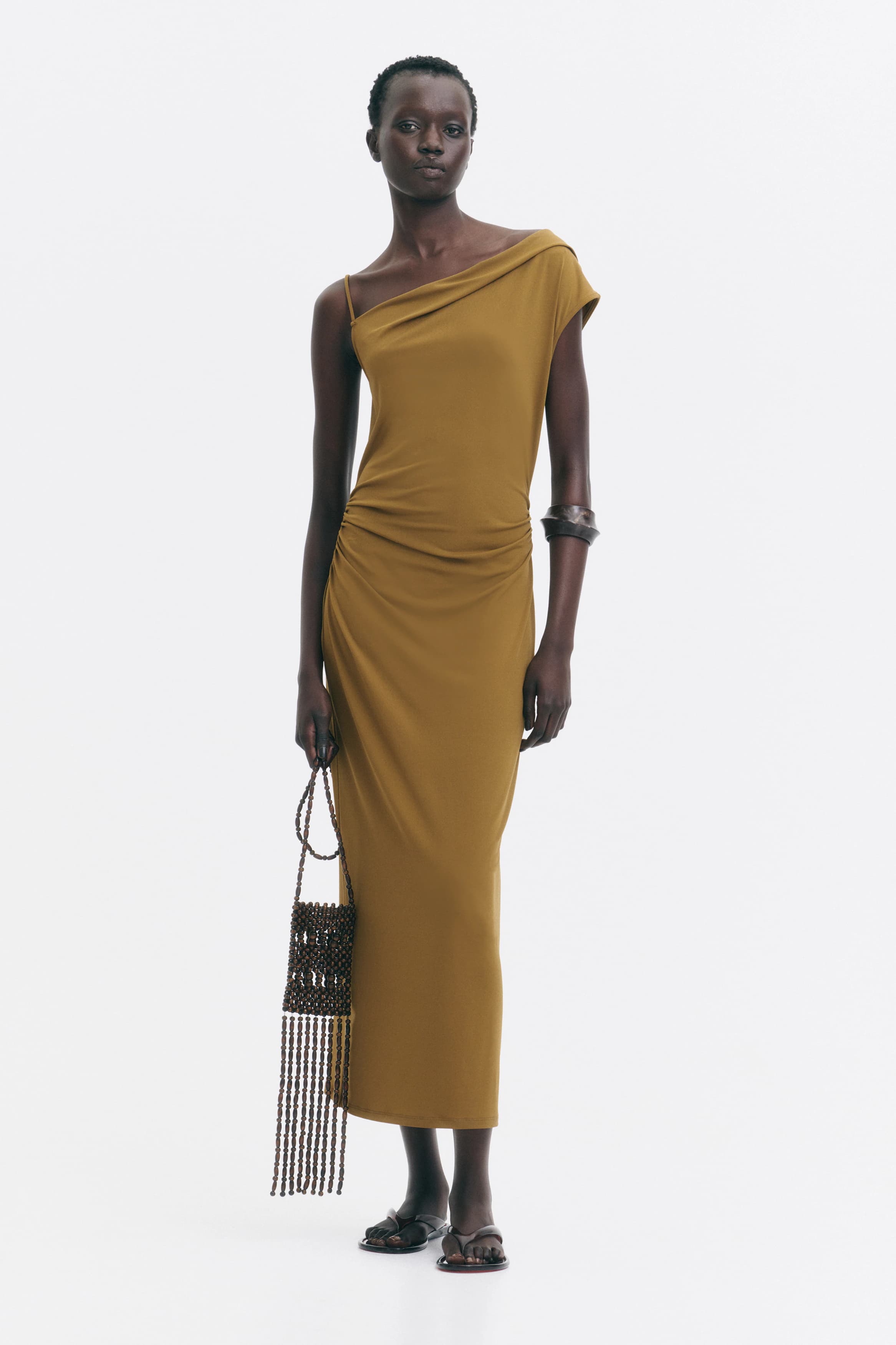 Asymmetrische tricot jurk