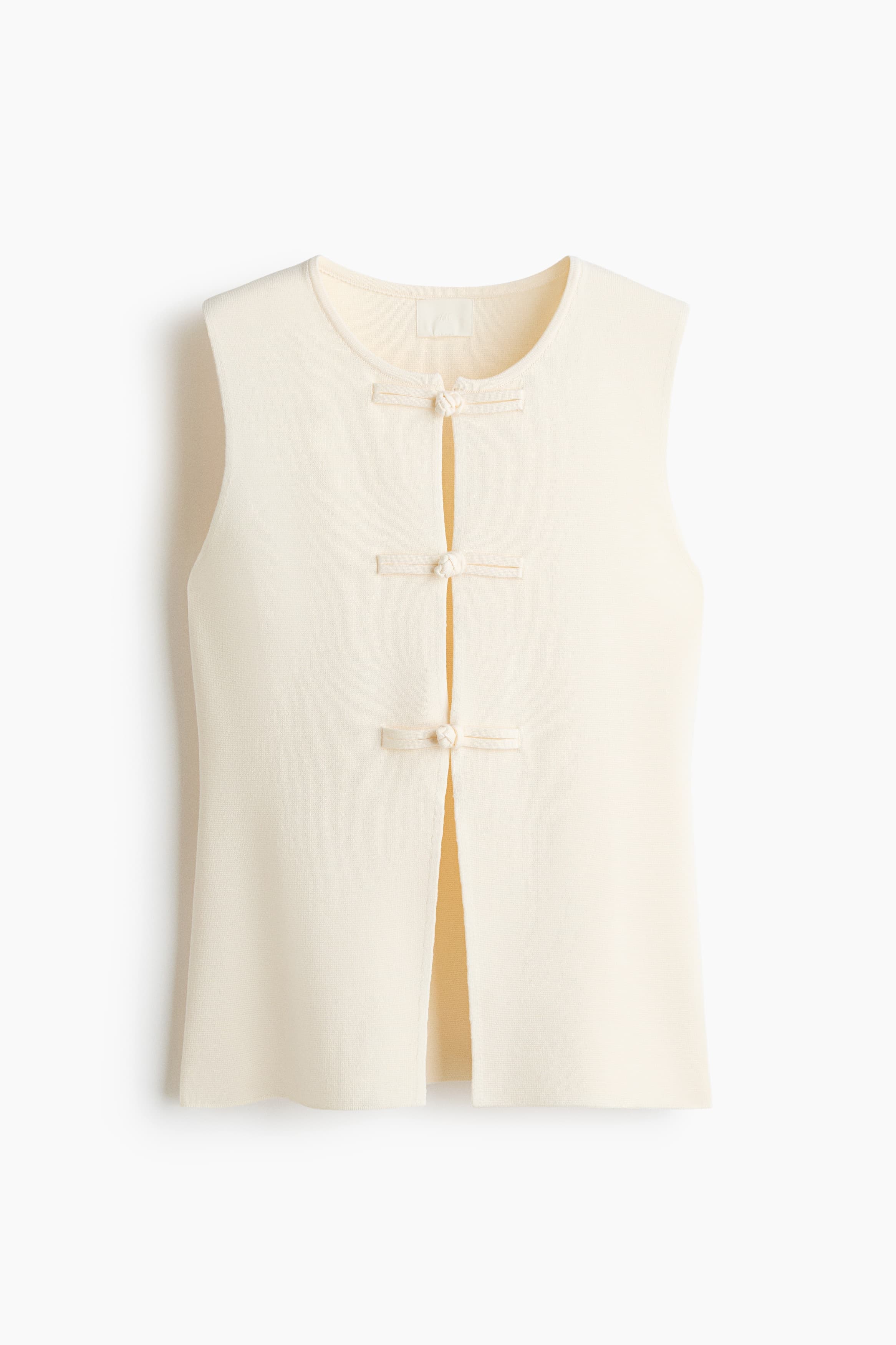 Mouwloze top met knoopsluiting voor