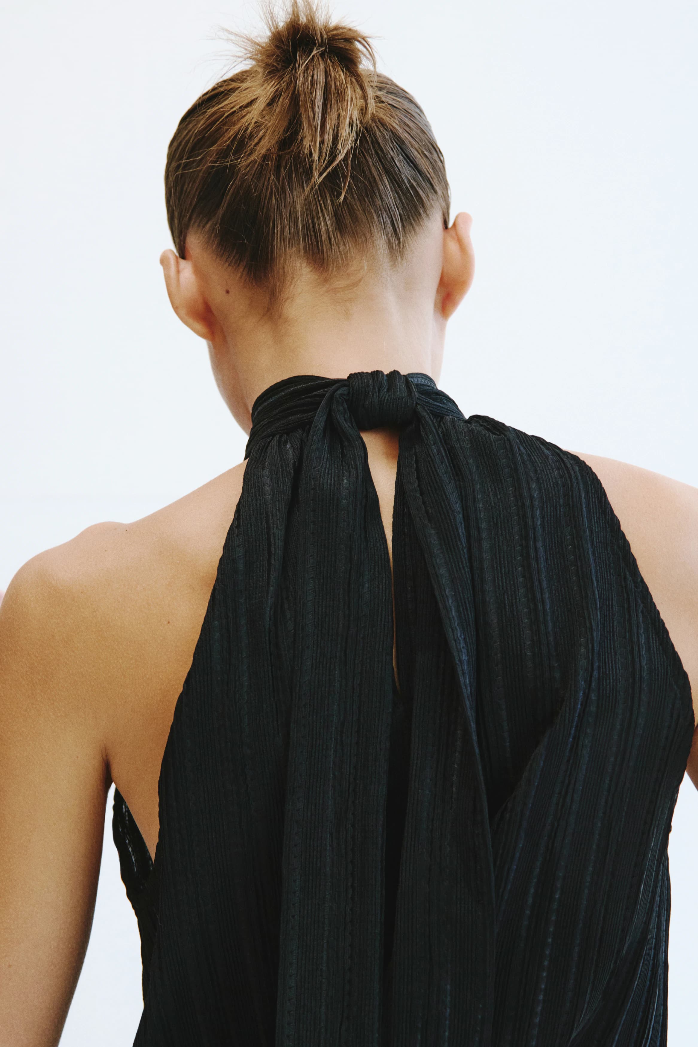 Top van structuurtricot